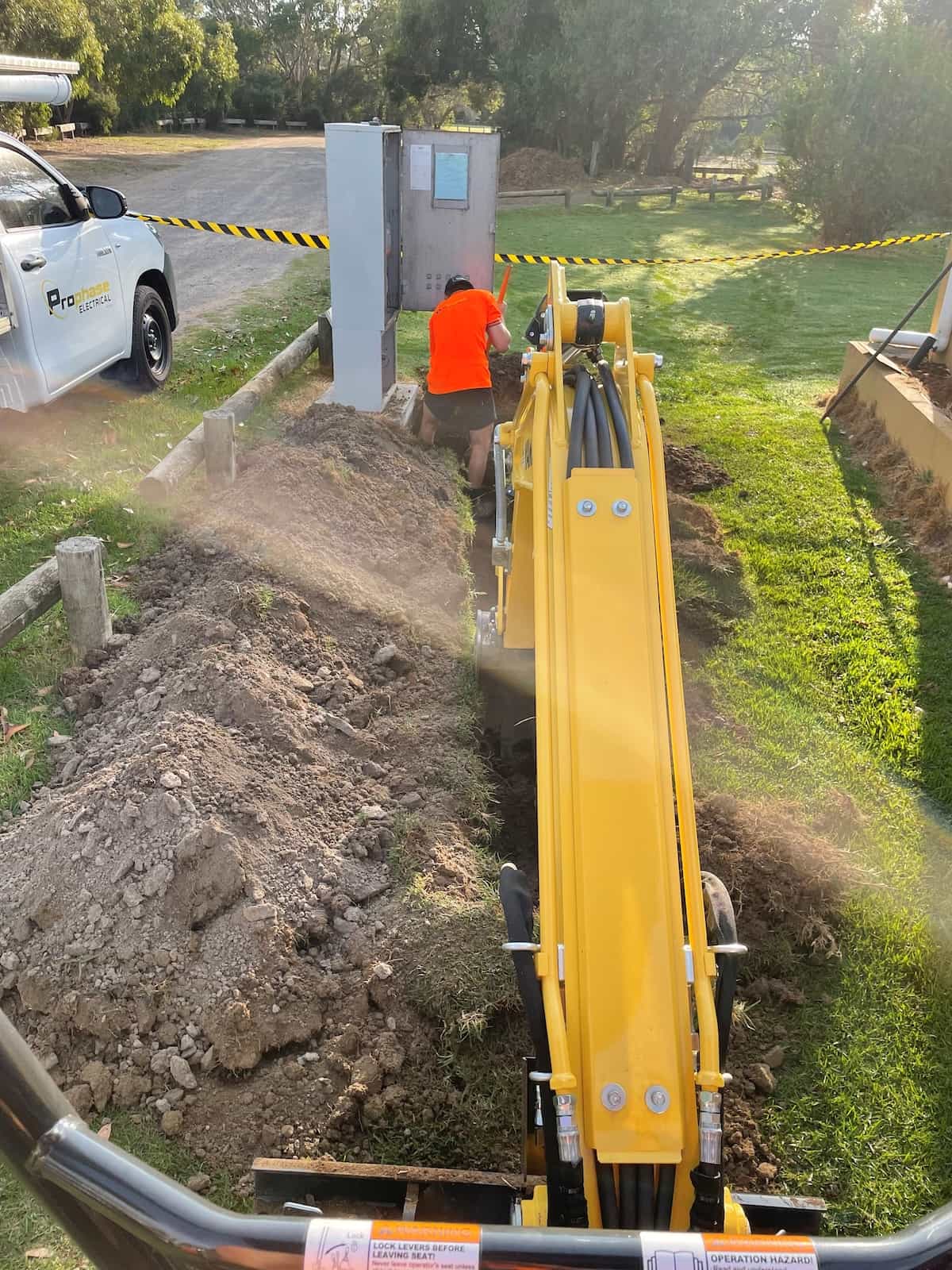 Electrical trenching for underground cable installation.